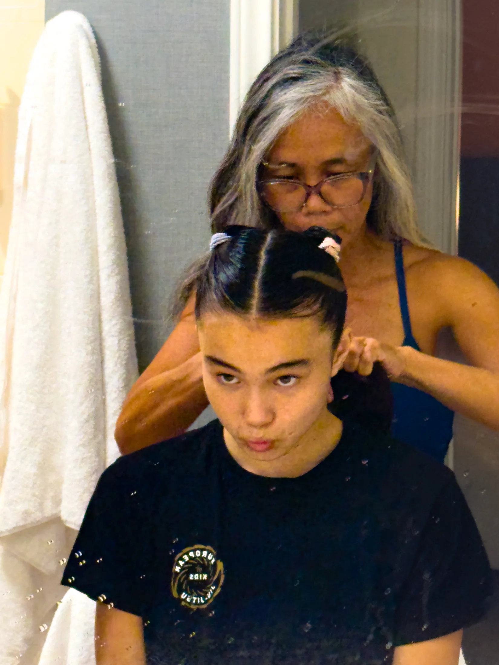 Bailey Heinsohn getting her hair ready before competing at the 2026 ADCC Youth World Championships in Austin, Texas