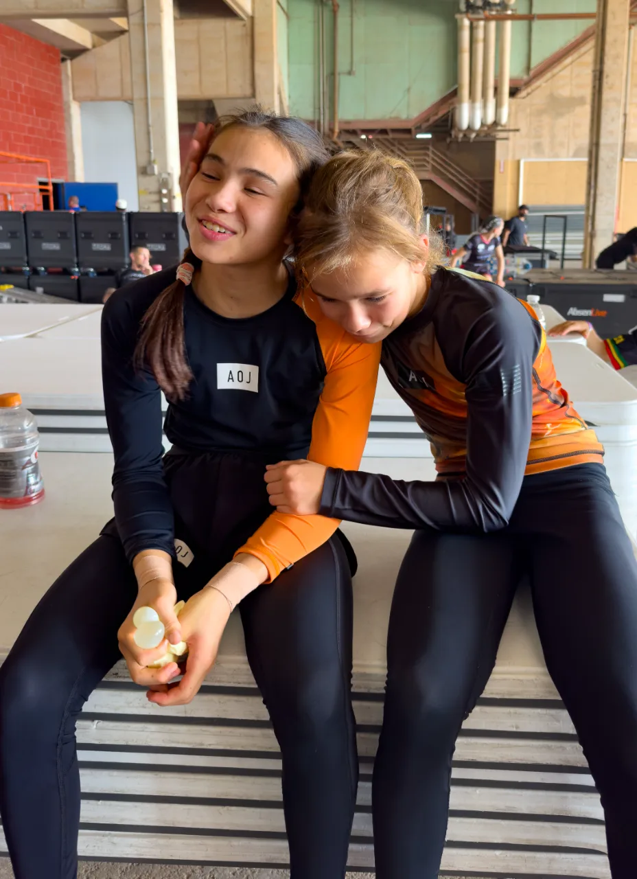Bailey Heinsohn and Sahara Wells together moments before facing each other in the 40 kg final at the 2026 ADCC Youth World Championships in Austin, Texas.