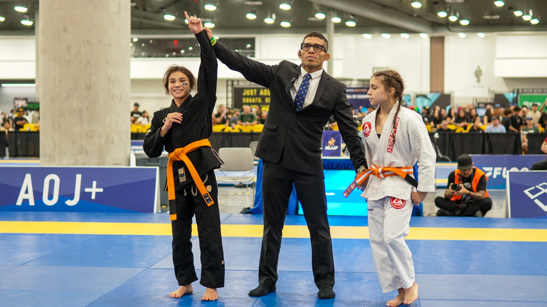 The referee raises Bailey Heinsohn’s arm after her Gi final against Jazmyn Alexis Lopez at the 2026 IBJJF Jiu-Jitsu CON in Las Vegas.