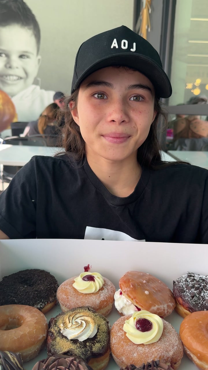 After winning No-Gi gold at the 2026 IBJJF Jiu Jitsu CON, Bailey celebrated with donuts. She had moved up in weight for the harder challenge and competed roughly 10 pounds under the division limit—so there was plenty of room to enjoy the fun parts of the weekend, too.