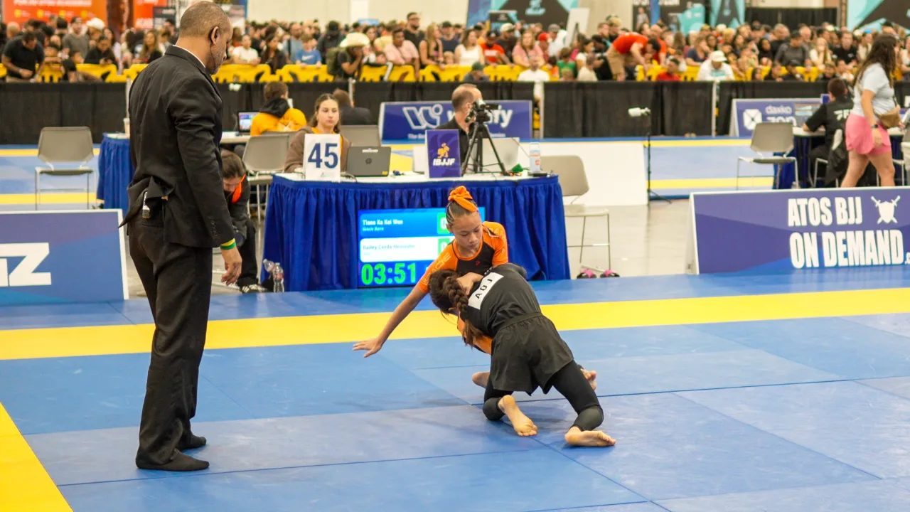 Bailey Heinsohn and Tiana Ka Kei Wan competing on the mat during the No-Gi final at the 2026 IBJJF Jiu-Jitsu CON in Las Vegas.
