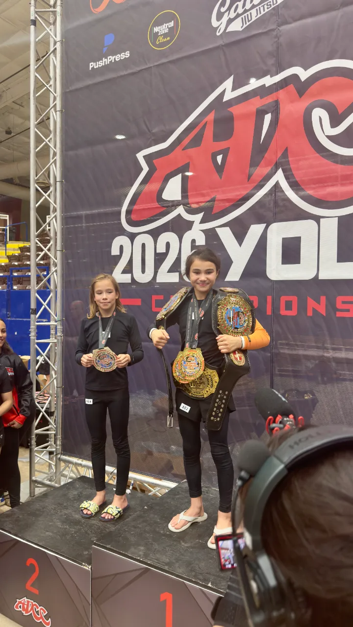 Bailey Heinsohn standing on the podium at the 2026 ADCC Youth World Championships.